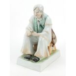 Zsolnay Pecs, Hungarian porcelain seated gentleman, 32cm high