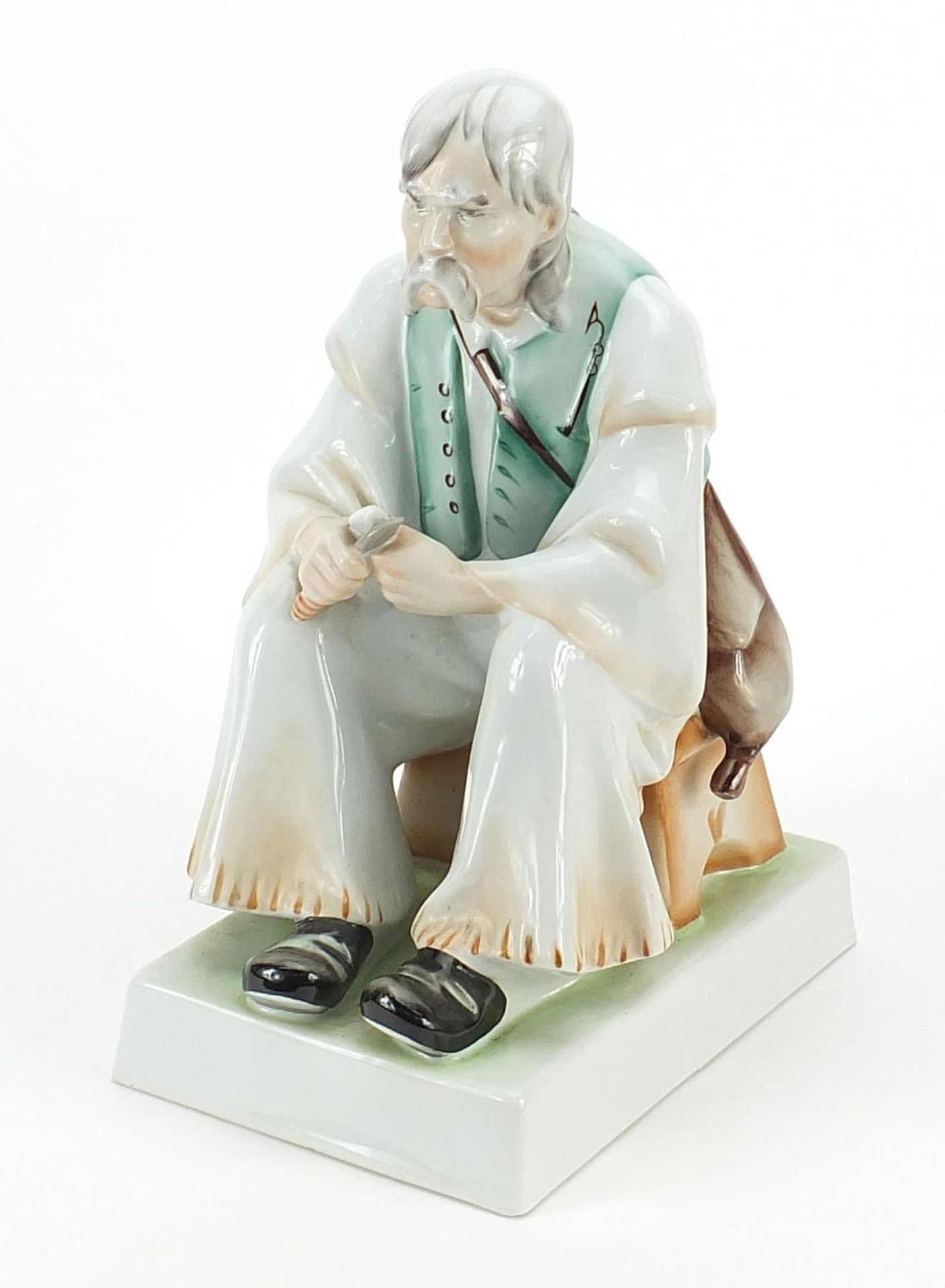 Zsolnay Pecs, Hungarian porcelain seated gentleman, 32cm high