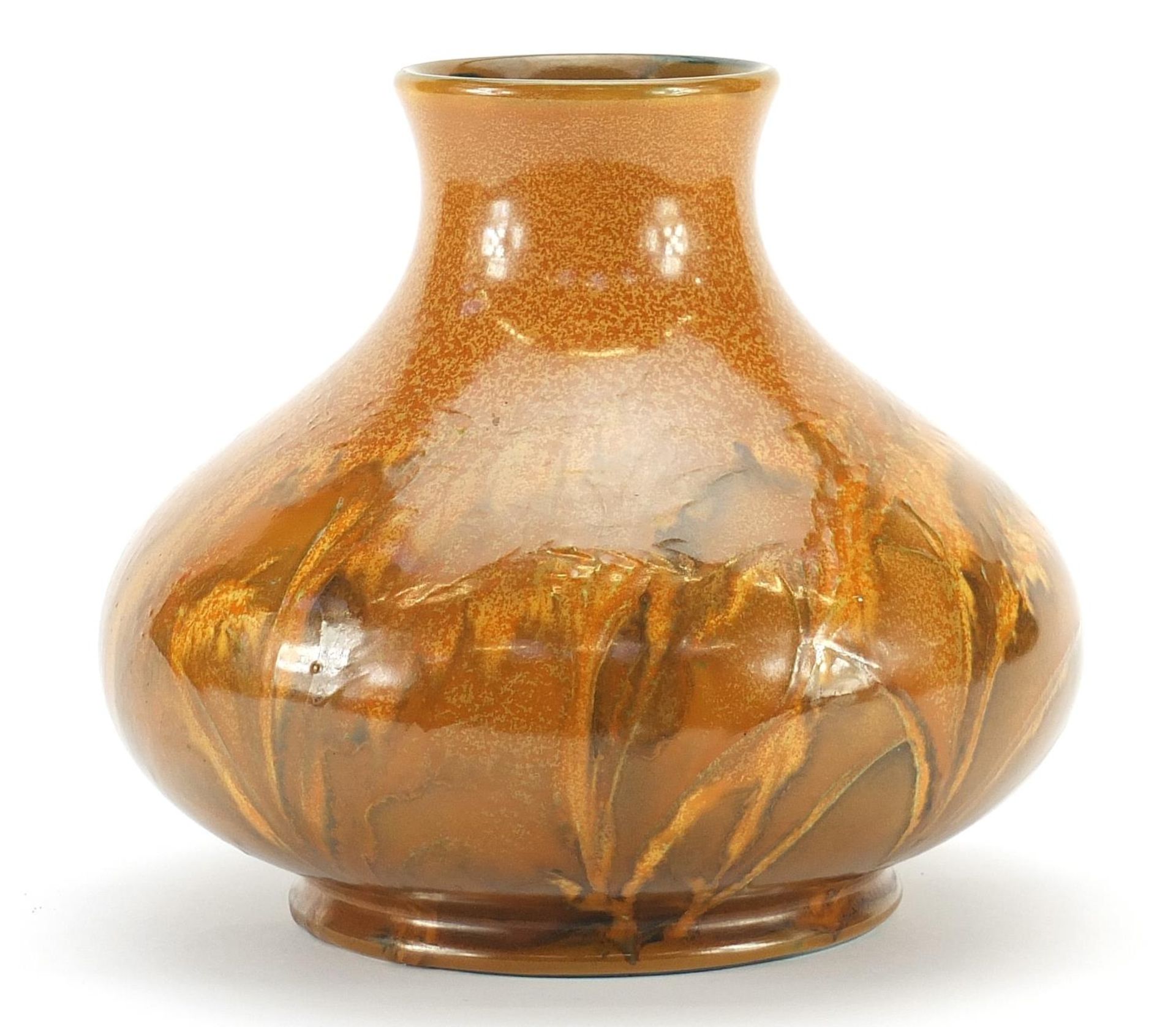 William Moorcroft pottery vase having a mottled orange glaze, 15.5cm high