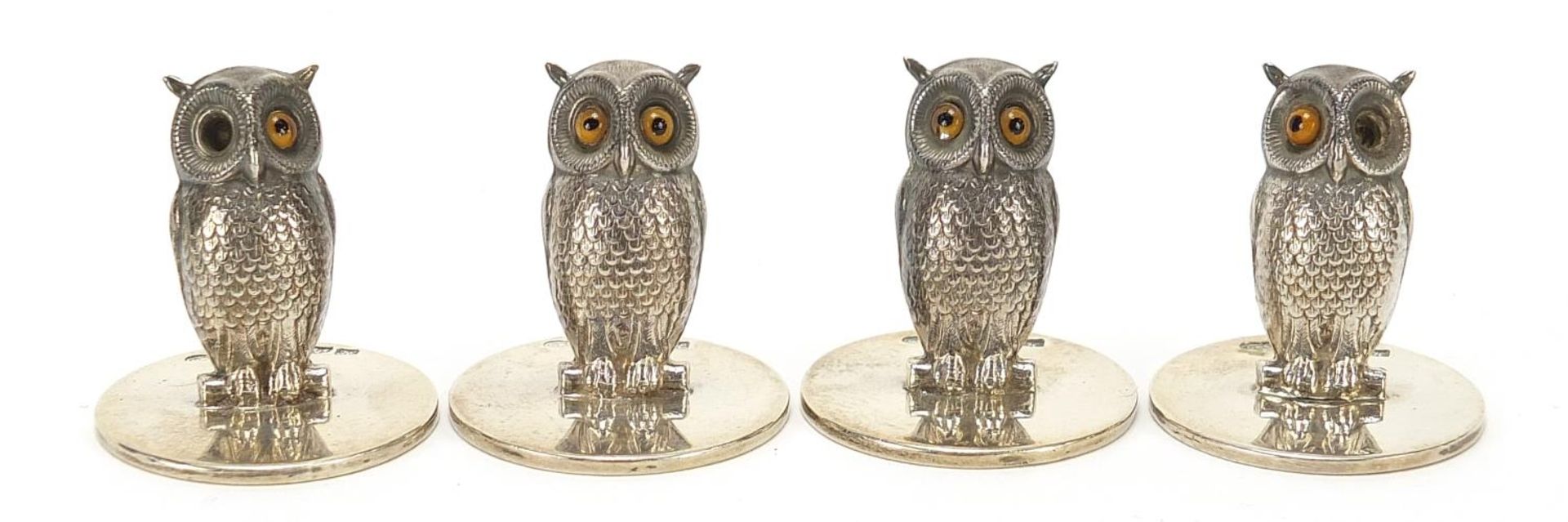 Goldsmiths & Silversmiths set of four novelty silver owl menu holders, registered number 433091,