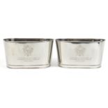 Pair of Champagne ice buckets with Napoleon Bonaparte and Lily Bollinger mottos, each 18cm high x