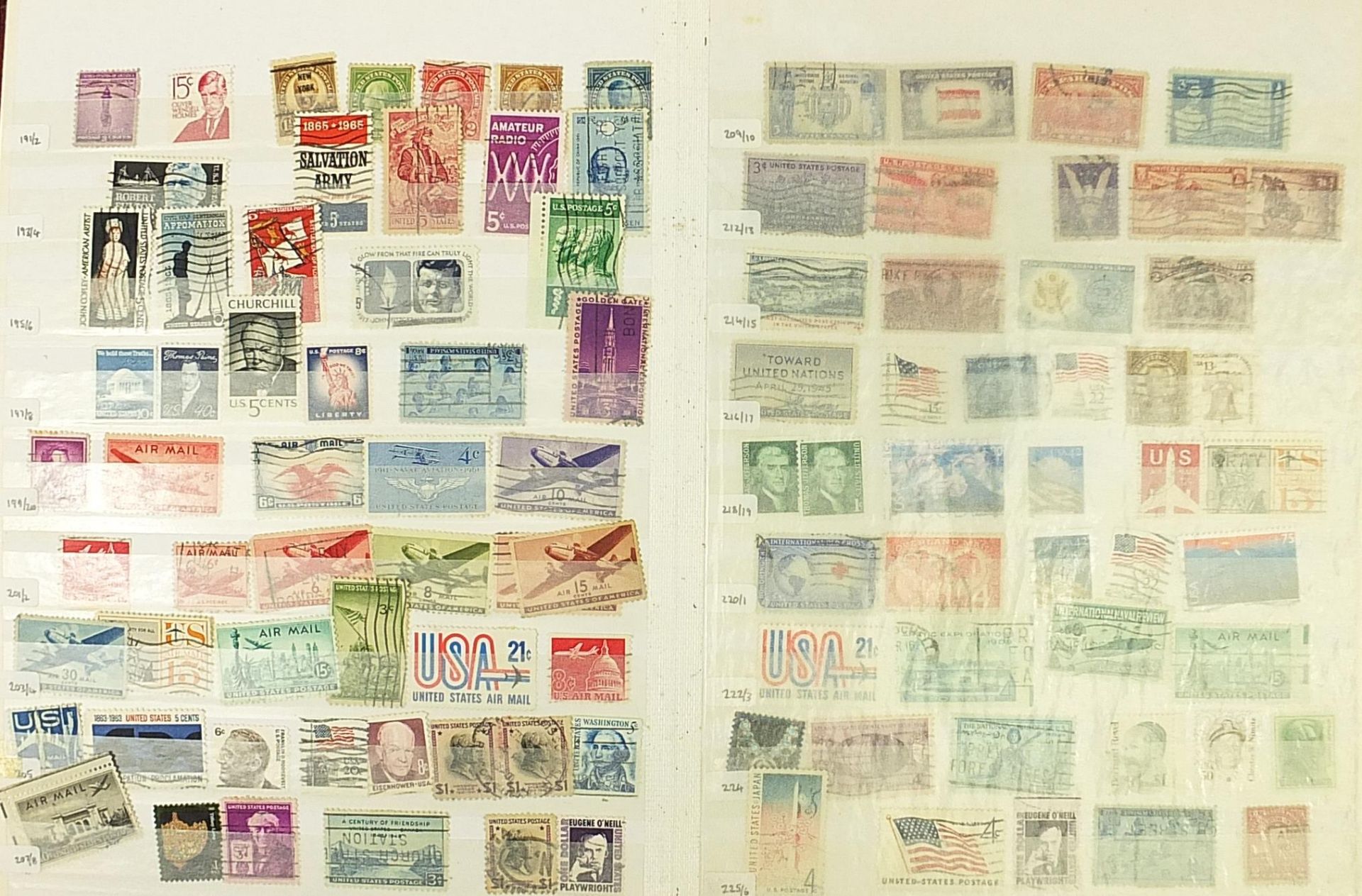 United States of America stamps arranged in an album including early Presidents
