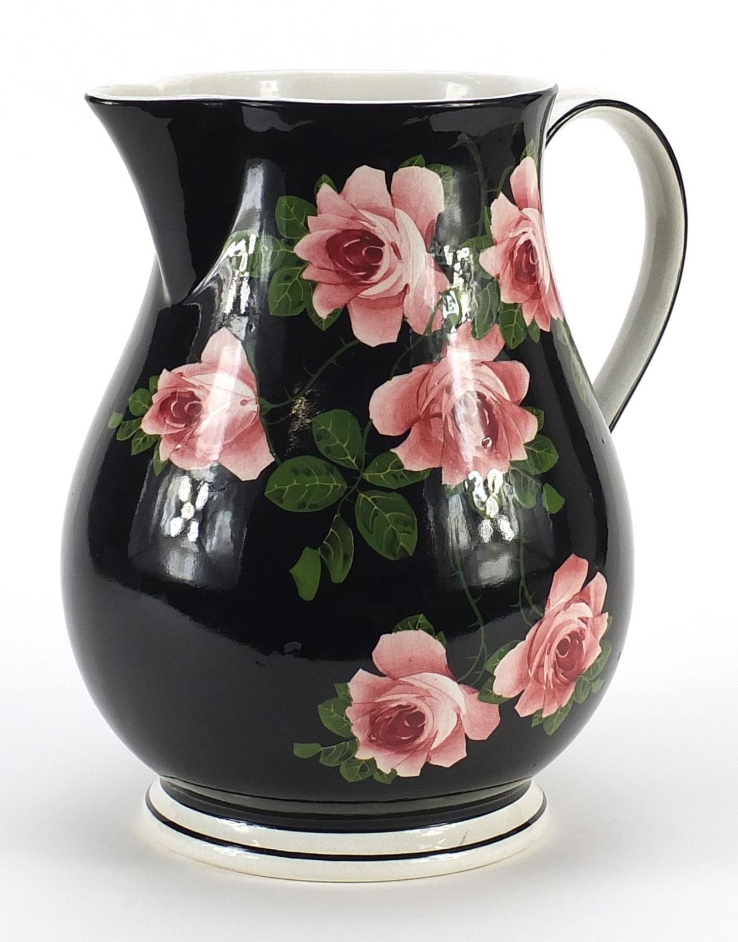 Large Bristol porcelain jug decorated with roses, 27cm high