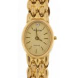 Accurist, ladies 9ct gold Accurist Gold wristwatch with 9ct gold strap, the case 15mm wide, 14.5g