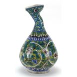 Large Middle Eastern Iznik style pottery vase hand painted with flowers, 37cm high