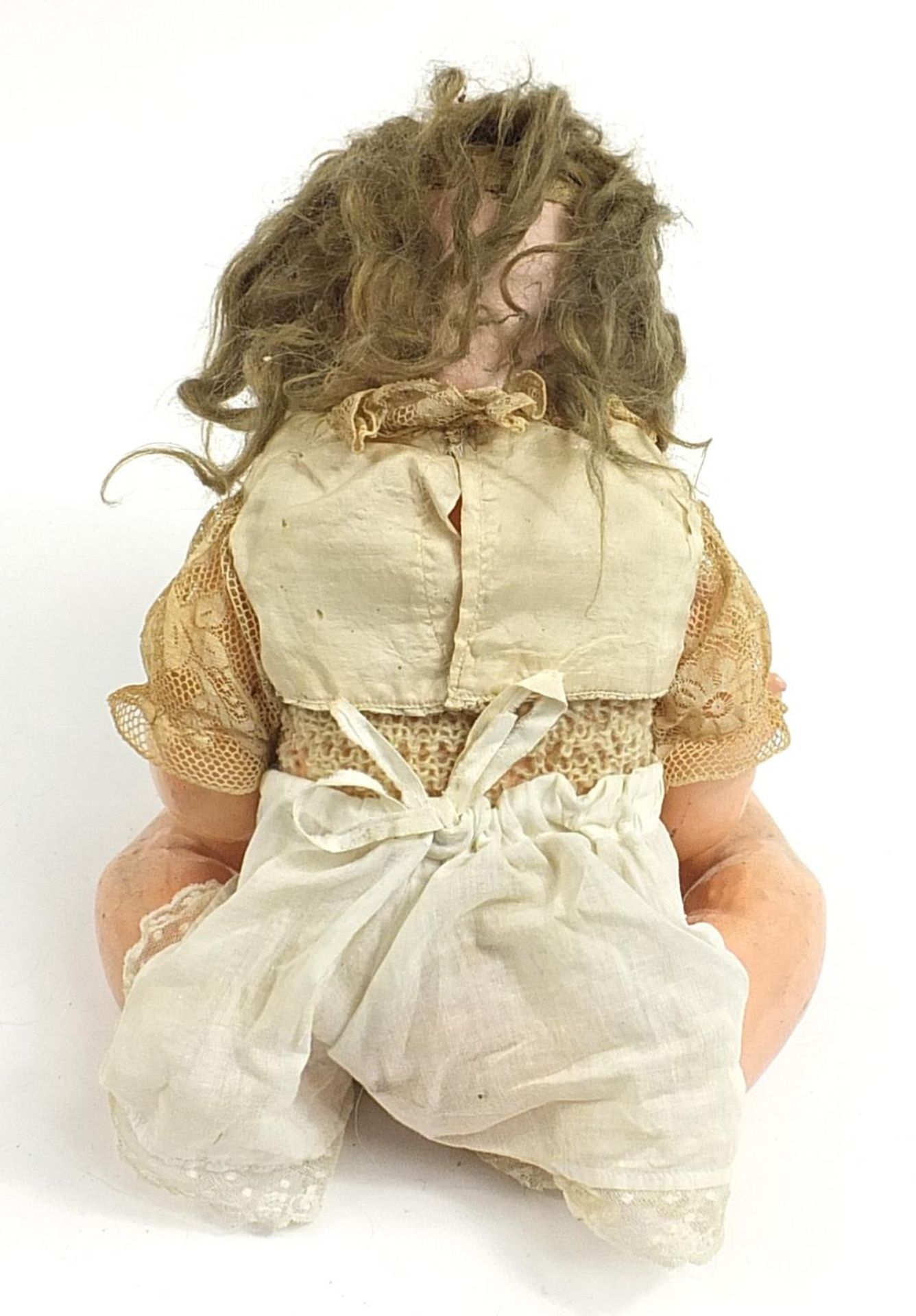 German bisque headed doll with jointed limbs, numbered 169 to the back of the head, 48cm in length - Image 4 of 4