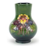 Moorcroft pottery vase hand painted with flowers, 11cm high