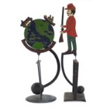 Two painted counter balance rocking toys, the largest 53.5cm high