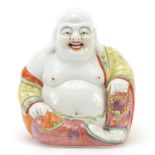 Chinese porcelain figure of Buddha, impressed marks to the base, 21.5cm high