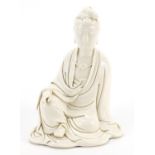 Chinese blanc de chine porcelain figure of Guanyin, impressed marks to the reverse, 21.5cm high