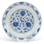 Chinese blue and white porcelain dish hand painted with flower heads amongst scrolling foliage,
