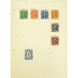 World stamps arranged in an album including Argentina to Touva