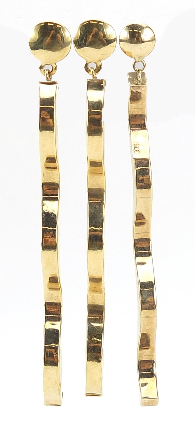 Three large 9ct gold drop earrings, 6.5cm high, 3.7g