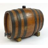 Breweriana interest metal bound oak barrel with tap, 32cm in length