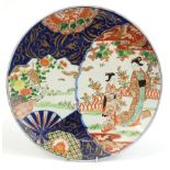 Japanese Imari porcelain charger hand painted with figures and birds of paradise, 40cm in diameter