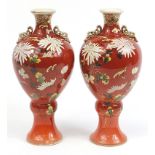 Pair of Japanese Satsuma pottery vases, 41cm high