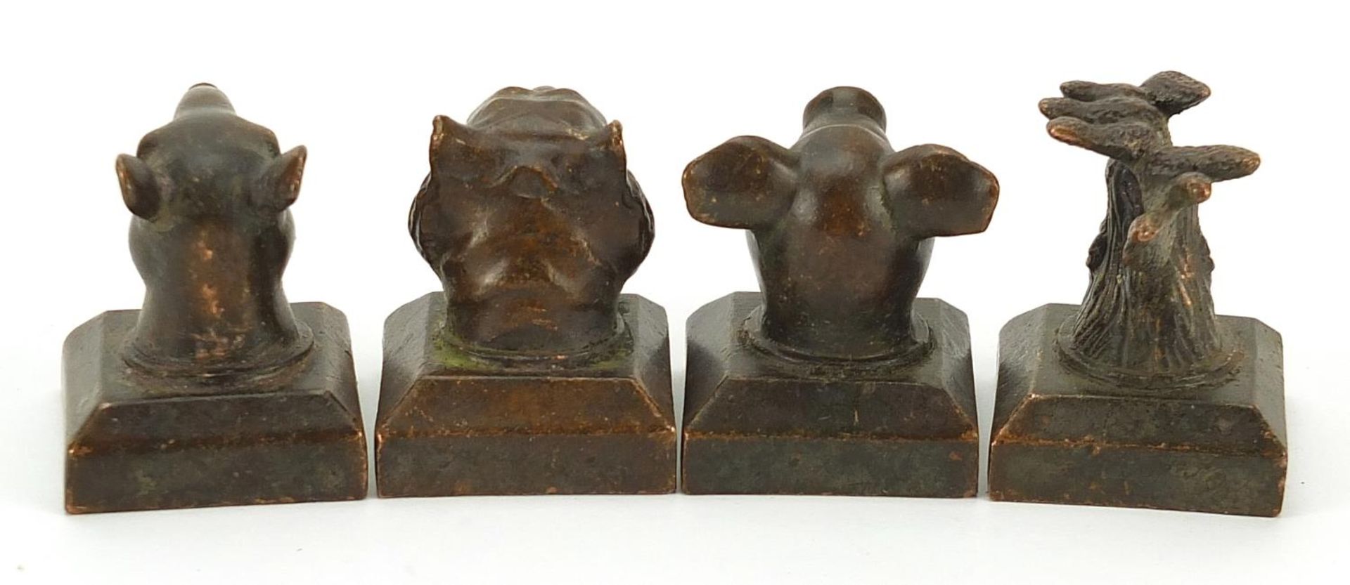 Four Chinese patinated bronze desk seals, the largest 4cm high - Image 2 of 3