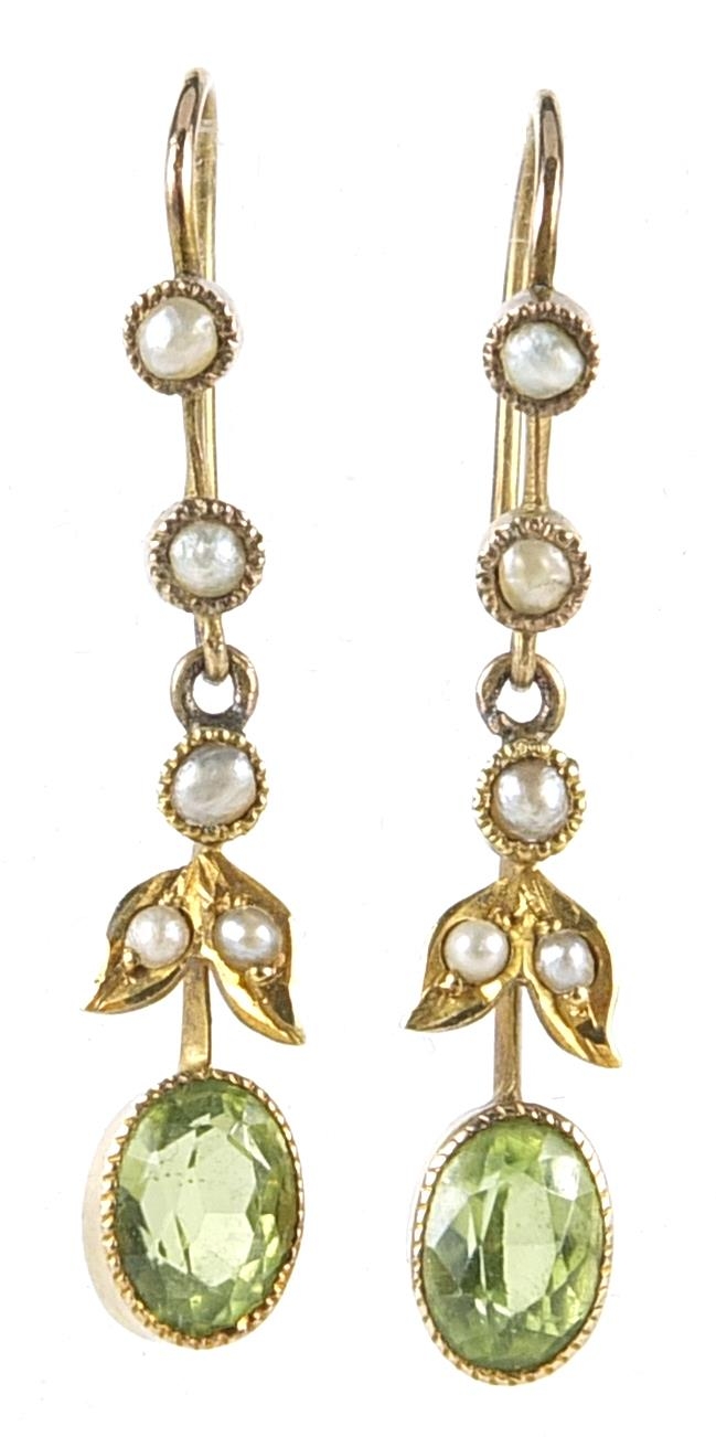 Pair of Victorian unmarked gold peridot and seed pearl drop earrings, 3cm high, 1.8g