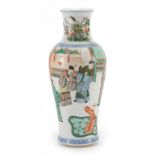 Chinese porcelain baluster vase hand painted in the famille verte palette with figures in a palace