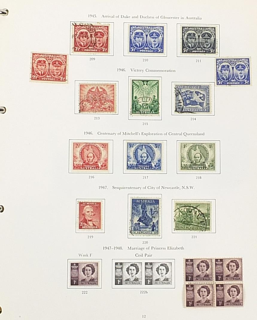 Australian stamps arranged in an album