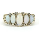 Antique unmarked gold graduated opal and diamond ring, size P, 5.4g
