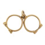 9ct gold handcuffs charm, 2.5cm in length, 0.9g