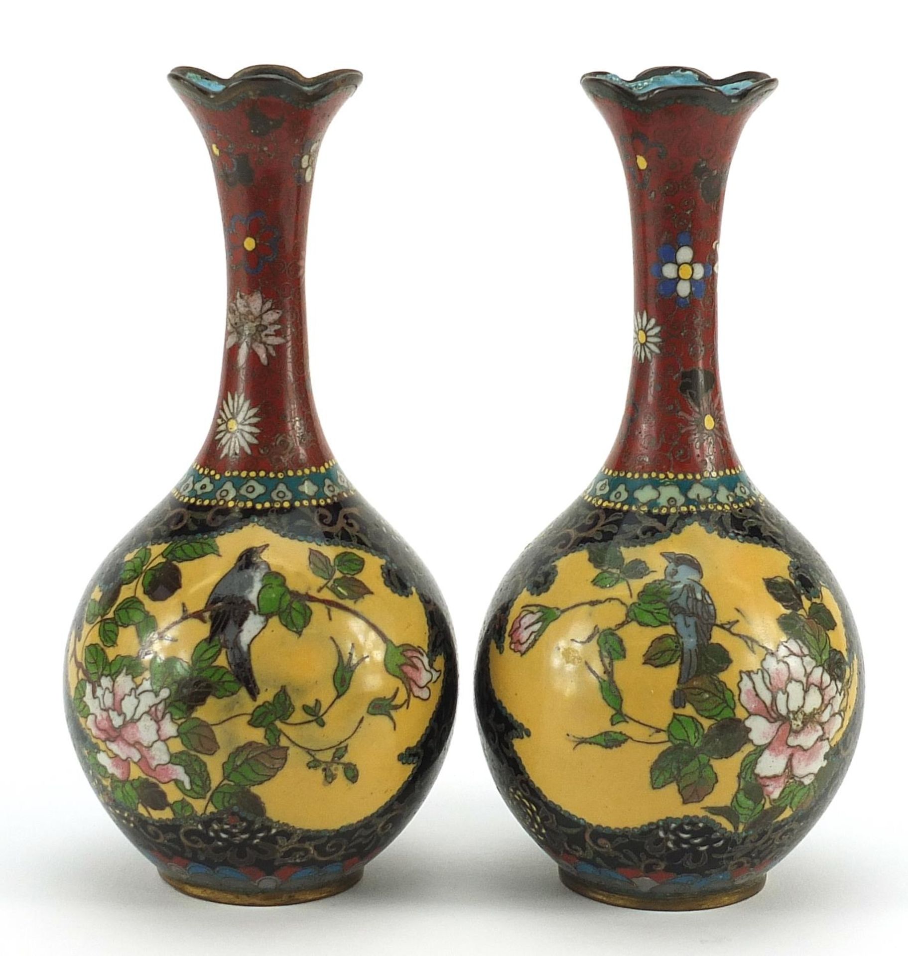 Pair of Japanese cloisonne vases enamelled with butterflies and birds amongst flowers, each 18.5cm