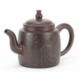 Chinese Yixing terracotta teapot decorated in relief with a figure and calligraphy, character
