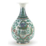 Chinese doucai porcelain vase hand painted with a phoenix and dragon amongst flowers, 28cm high
