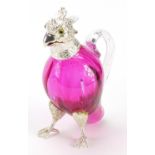 Silver plated and cranberry glass claret jug in the form of a cockatoo, 17.5cm high