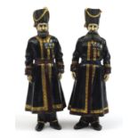 Large pair of cold painted bronze soldiers in Russian military uniform, impressed marks to the
