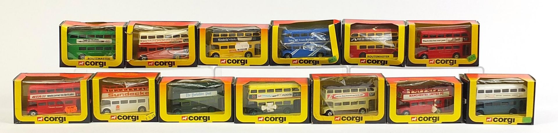 Group of Corgi diecast advertising buses