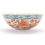 Chinese blue and white with iron red porcelain bowl hand painted with dragons chasing a flaming