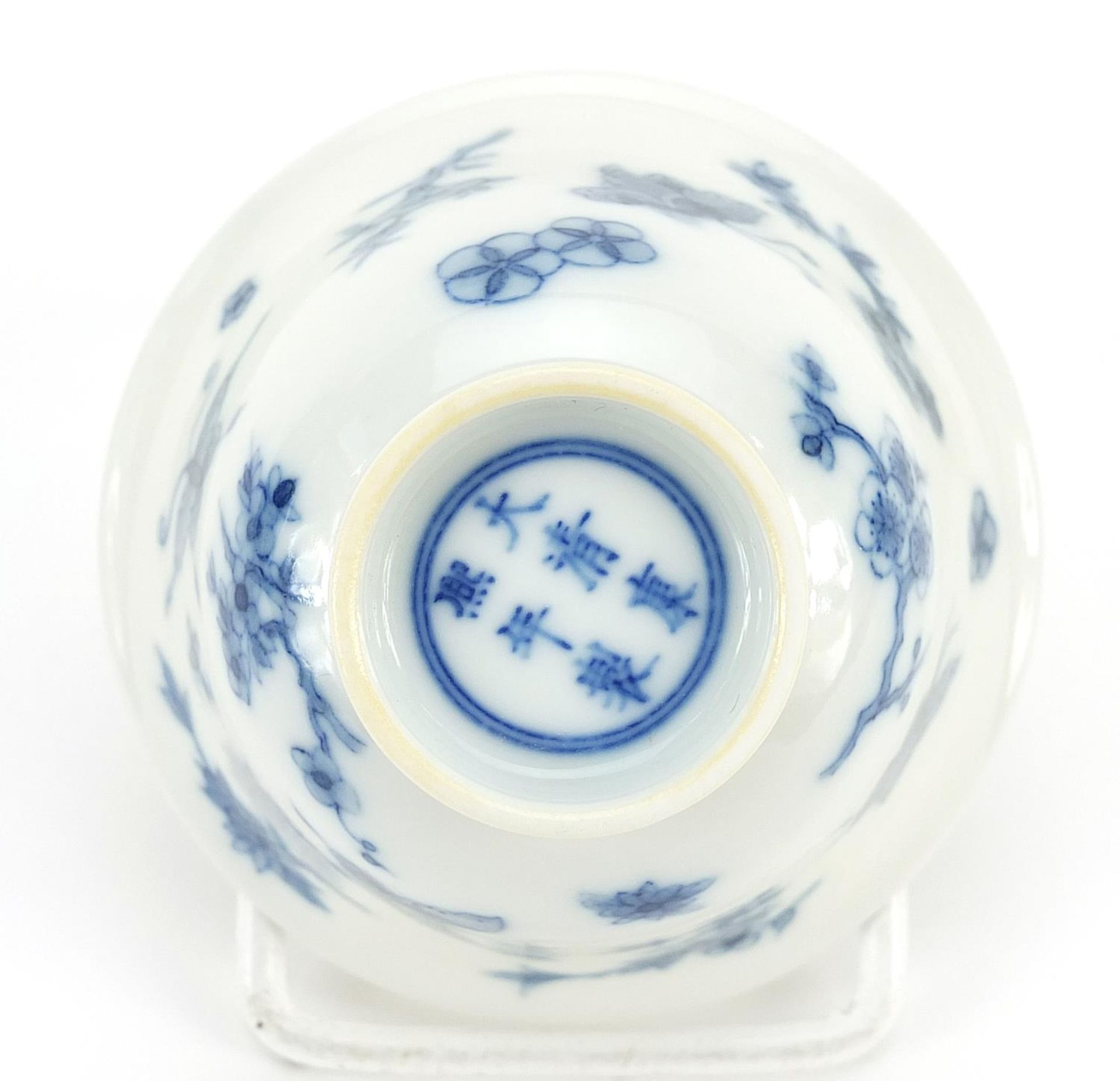 Chinese blue and white porcelain tea bowl hand painted with butterflies amongst flowers, six - Image 3 of 3