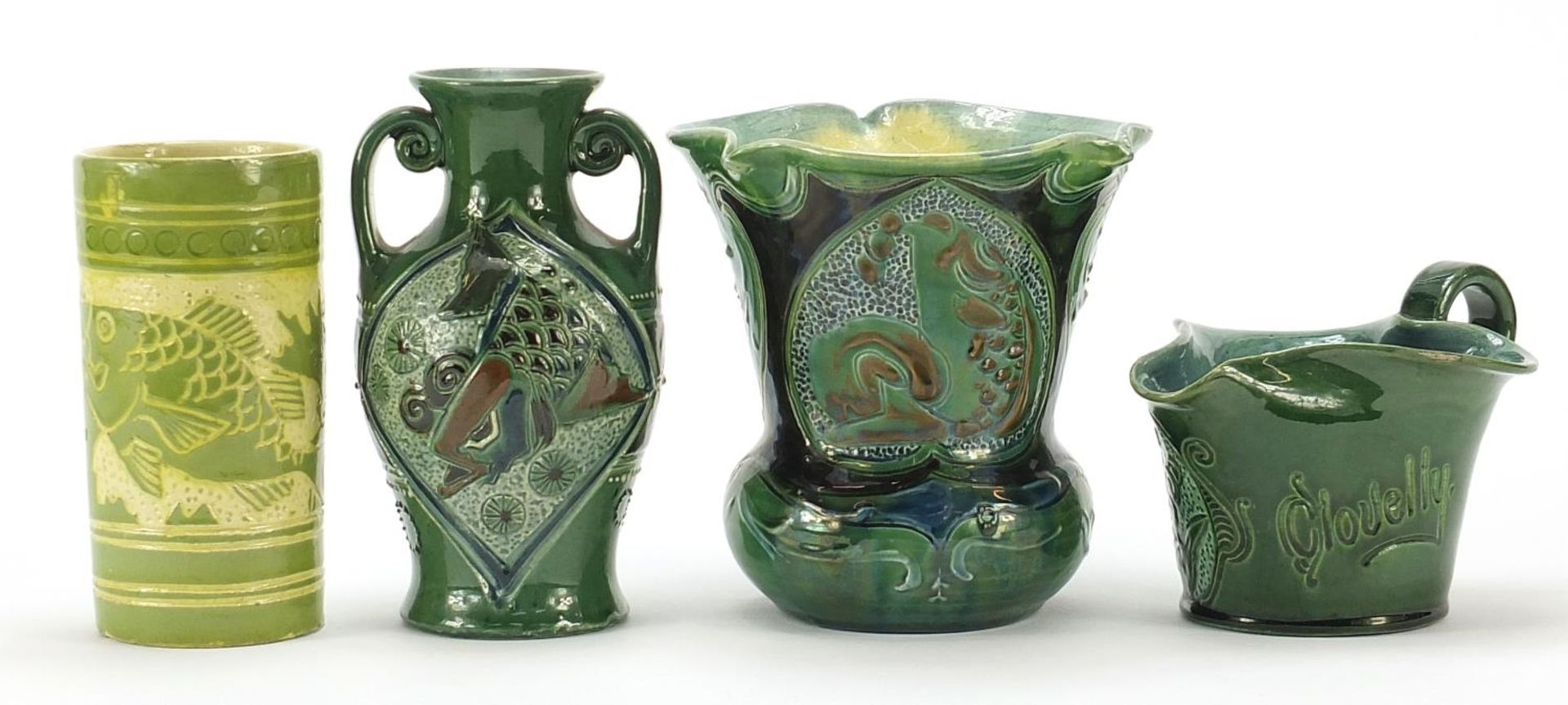 Four pottery vases and jugs including three by Brannam, the largest 15cm high