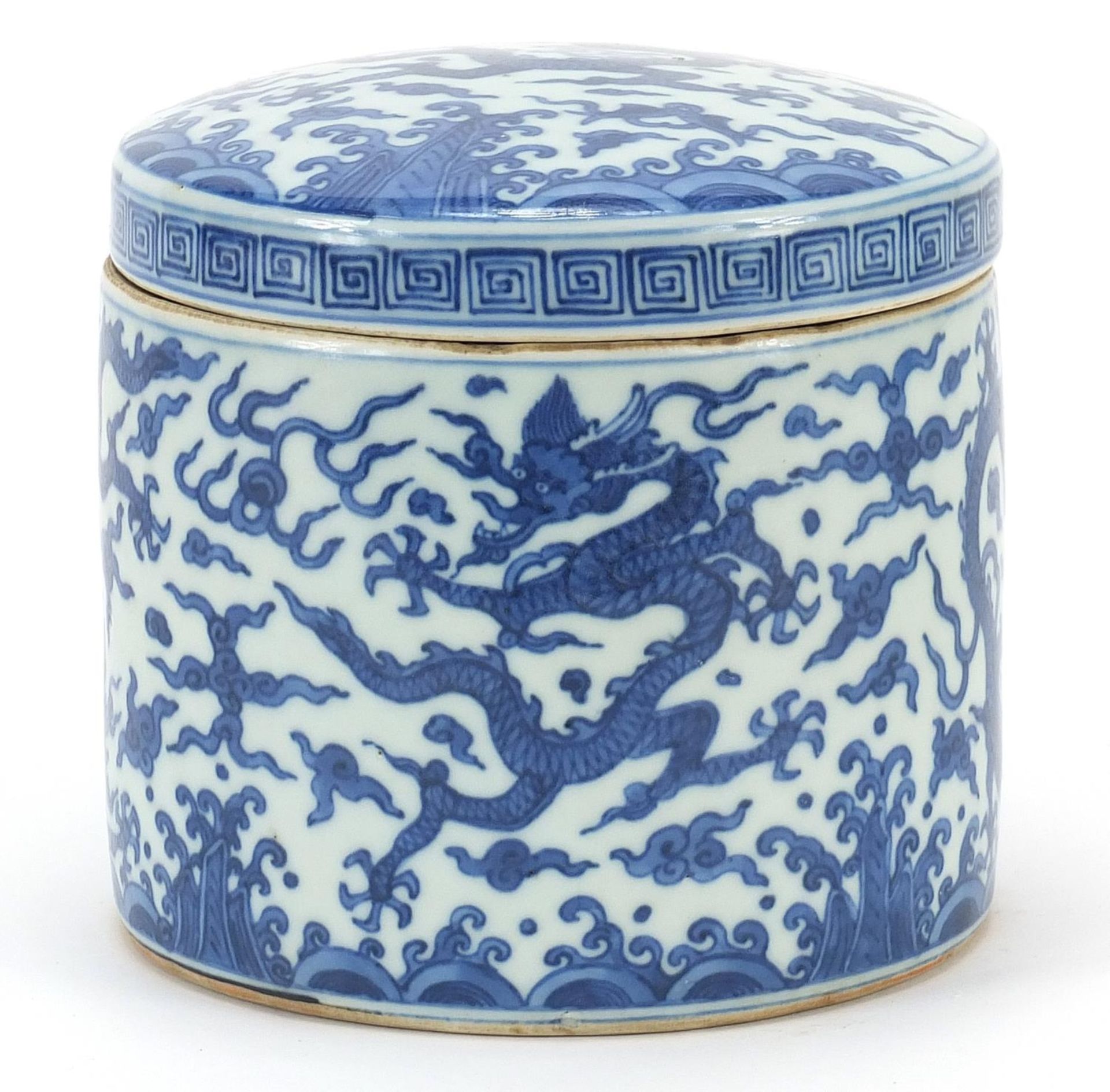 Chinese blue and white porcelain jar and cover, hand painted with dragons chasing a flaming pearl