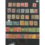 Collection of New Zealand stamps arranged in an album including Queen Victoria