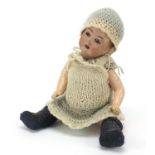 Armand Marseille bisque headed doll with jointed limbs, 26cm in length