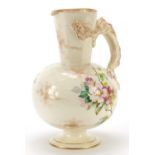 Late 19th century Doulton jug with dragon handle, hand painted with flowers, 25cm high