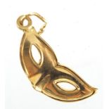 9ct gold masquerade mask charm, 1.7cm in length, 0.4g