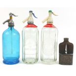 Three vintage glass soda syphons and a glass hip flask with silver plated mounts, the largest 32cm