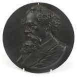 Circular cast iron plaque of Charles Darwin, 22cm in diameter