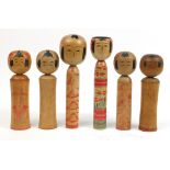 Six large Japanese Kokeshi wooden dolls, the largest 37.5cm high