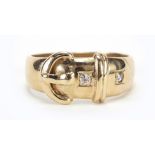 9ct gold diamond buckle ring, size U/V, 6.2g
