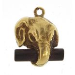 14ct gold elephant head charm, 1.4cm high, 1.1g