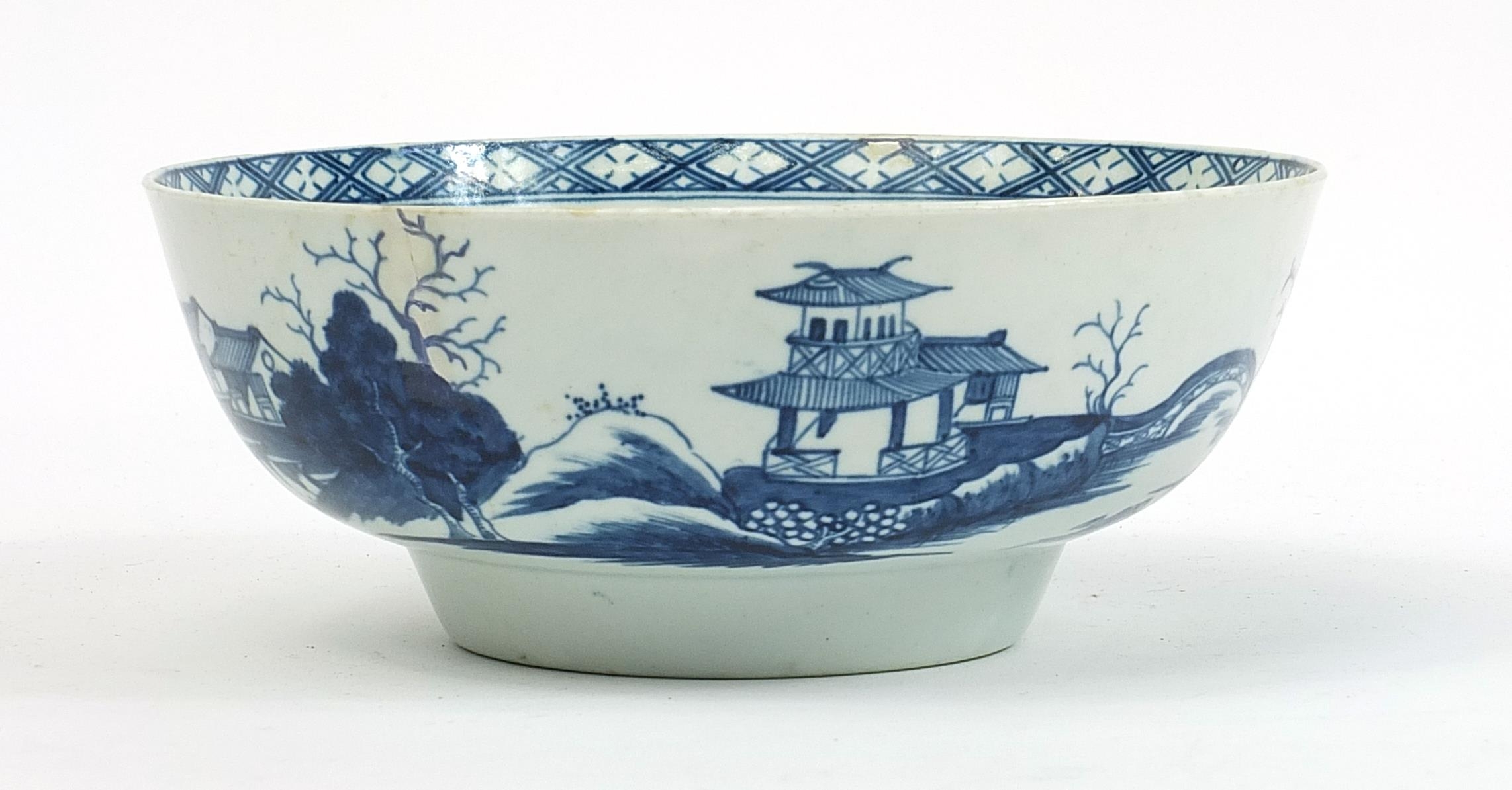 19th century English blue and white porcelain bowl hand painted in the chinoiserie manner with a