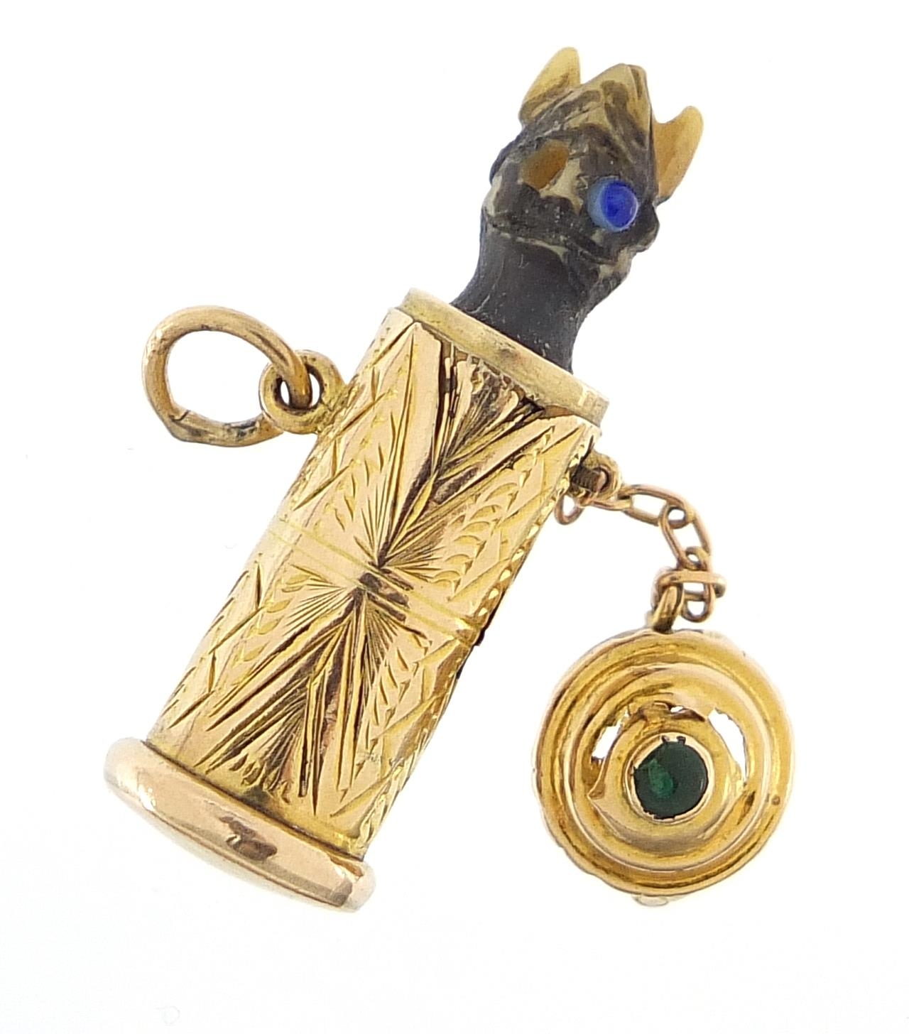 9ct gold jack in the box design charm with spring loaded figure, the lid set with a cabochon green