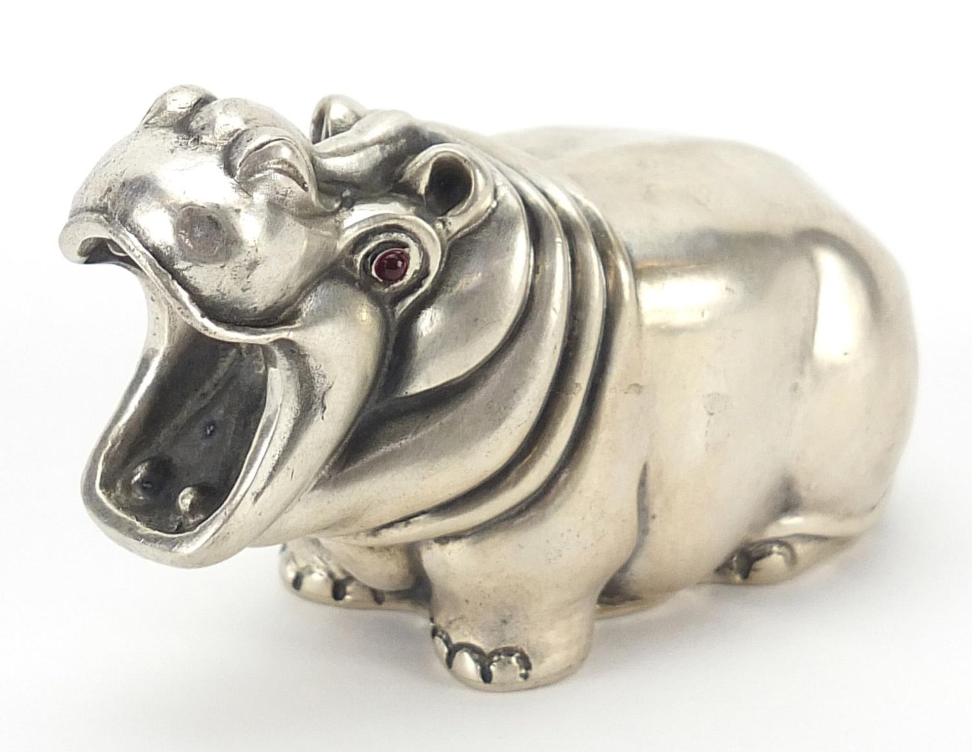 Silver hippopotamus with ruby eyes, impressed Russian marks to the base, 7cm in length, 73.6g