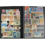 World stamps arranged in an album including India, Canada and Russia