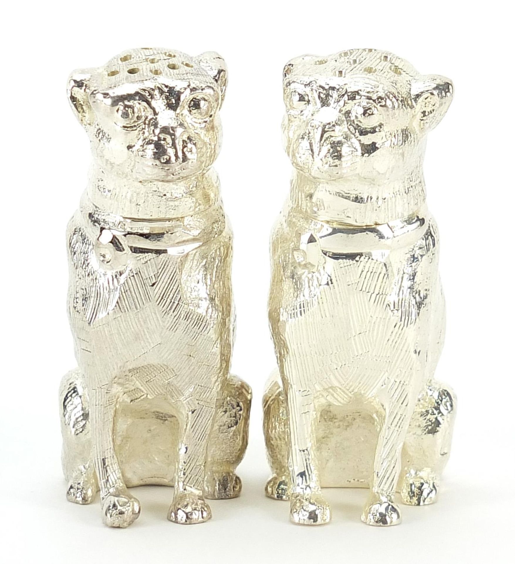 Pair of silver plated dog design pepperettes, each 6.5cm high